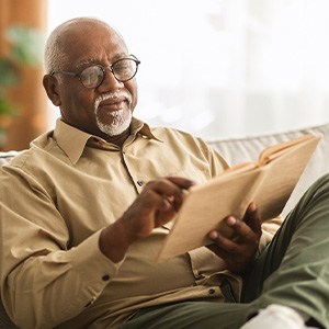 A man relaxing on a couch