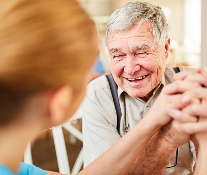 Local veteran smiling after free dental care 