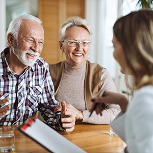 Couple talking to a receptionist
