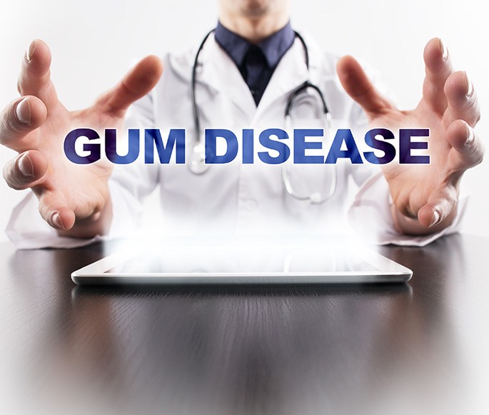 Gum disease wording floating above tablet with doctor in the background