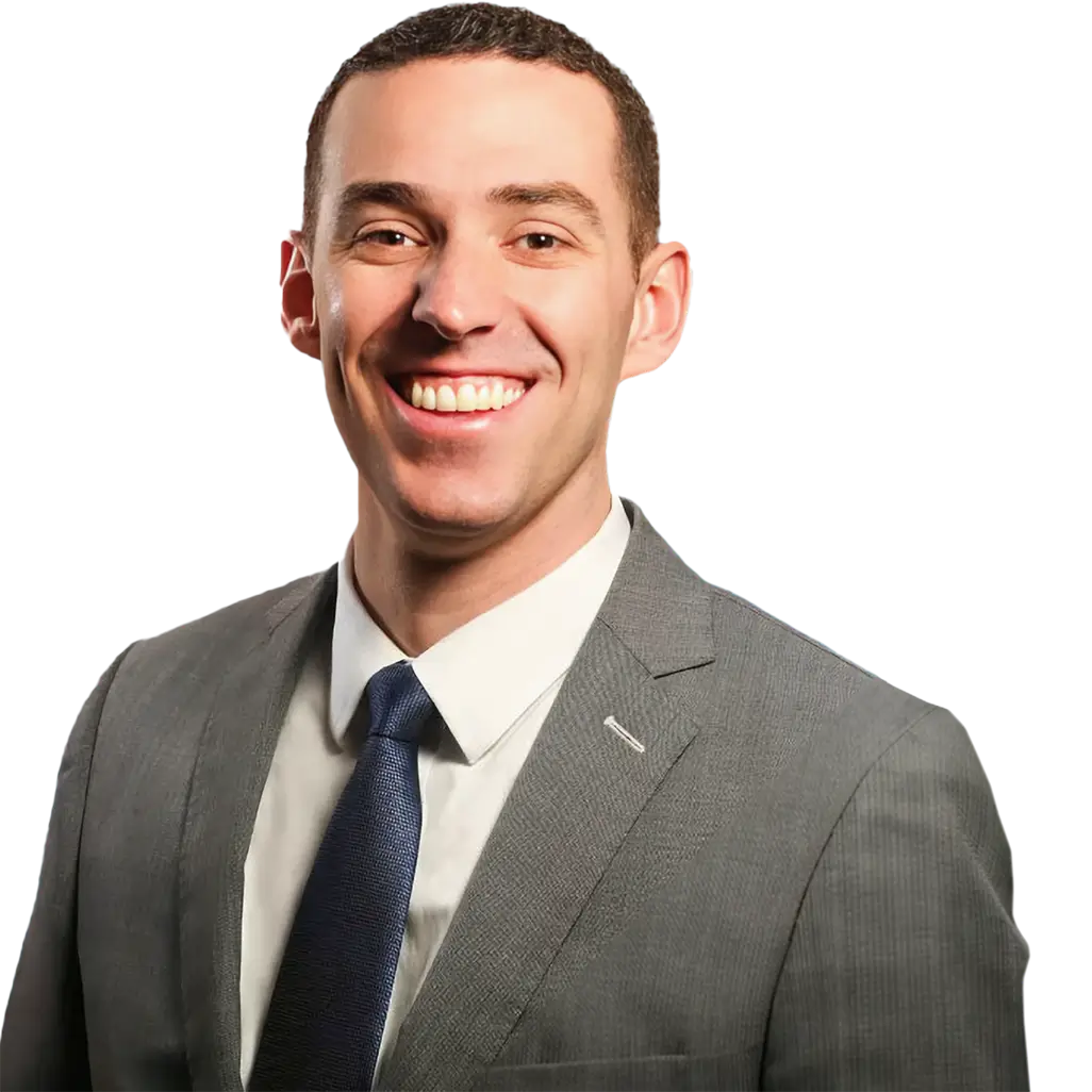 Salmon Creek dentist Doctor Joseph Kelly smiling in a suit