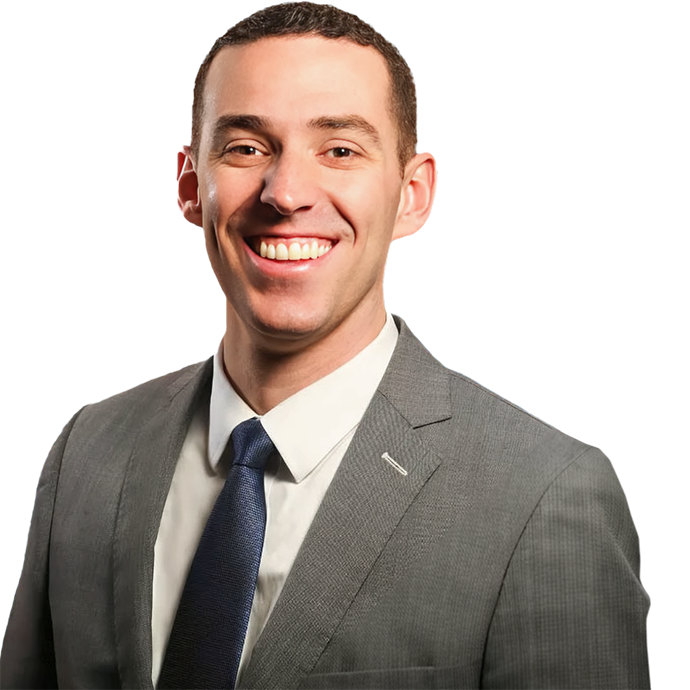 Salmon Creek dentist Doctor Joseph Kelly smiling in a suit